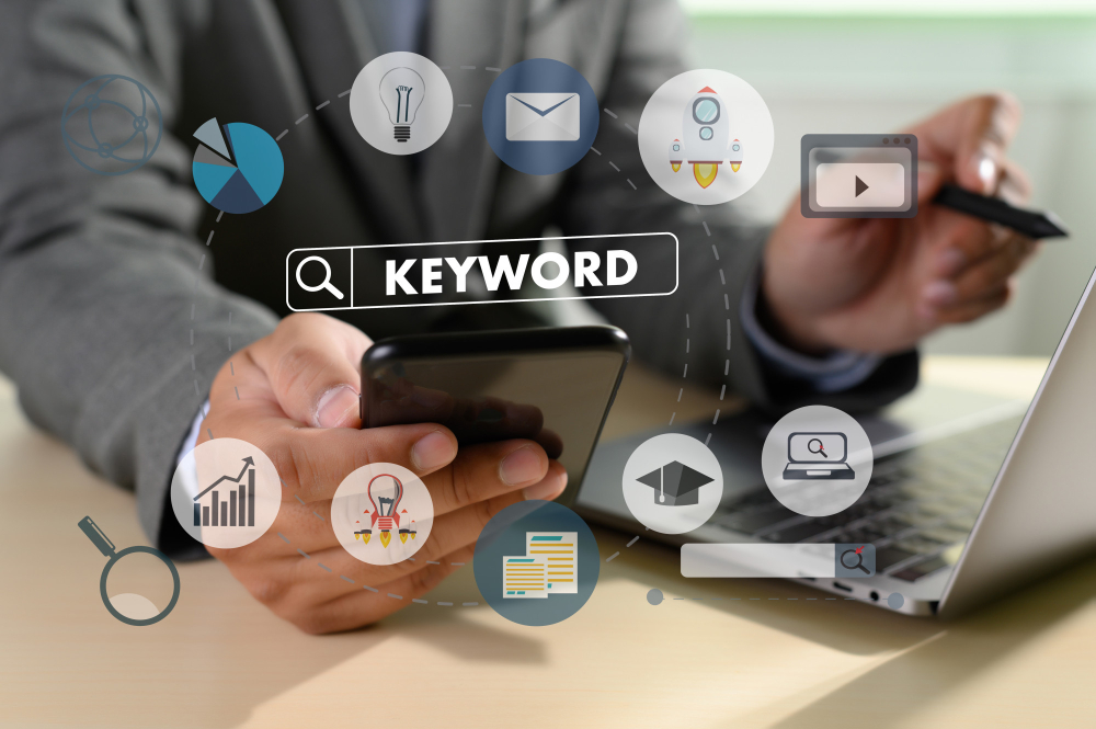 a person using a phone for keyword research and other SEO analytics