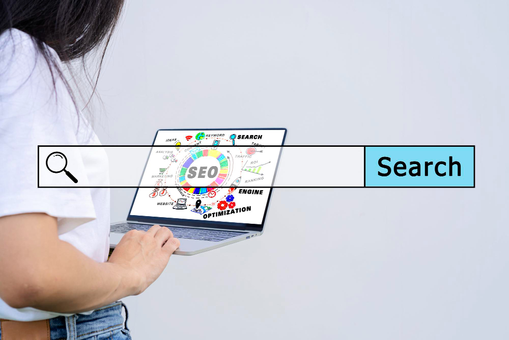 a person using a laptop for SEO and keyword research.